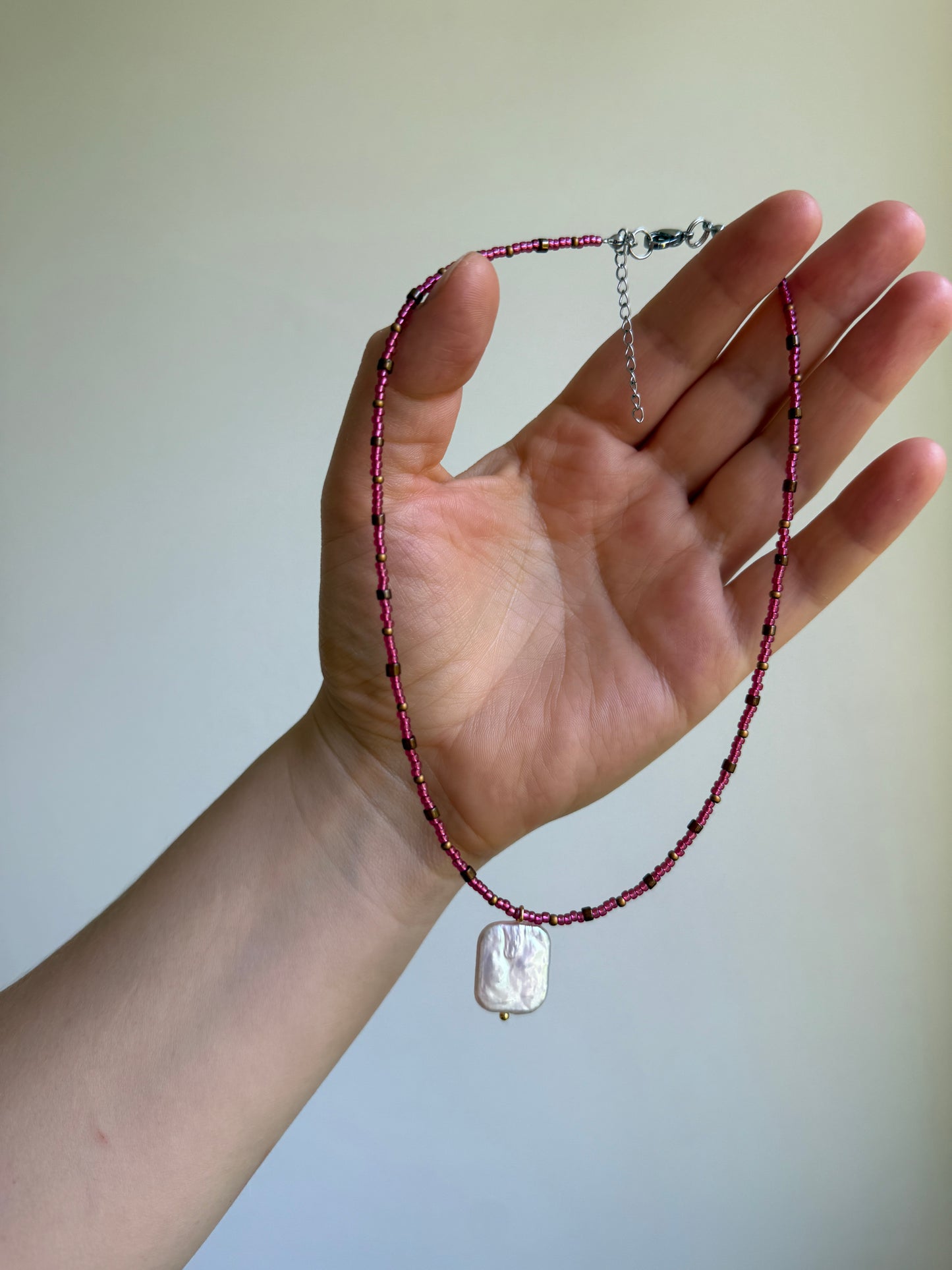 Beaded necklace with a pearl