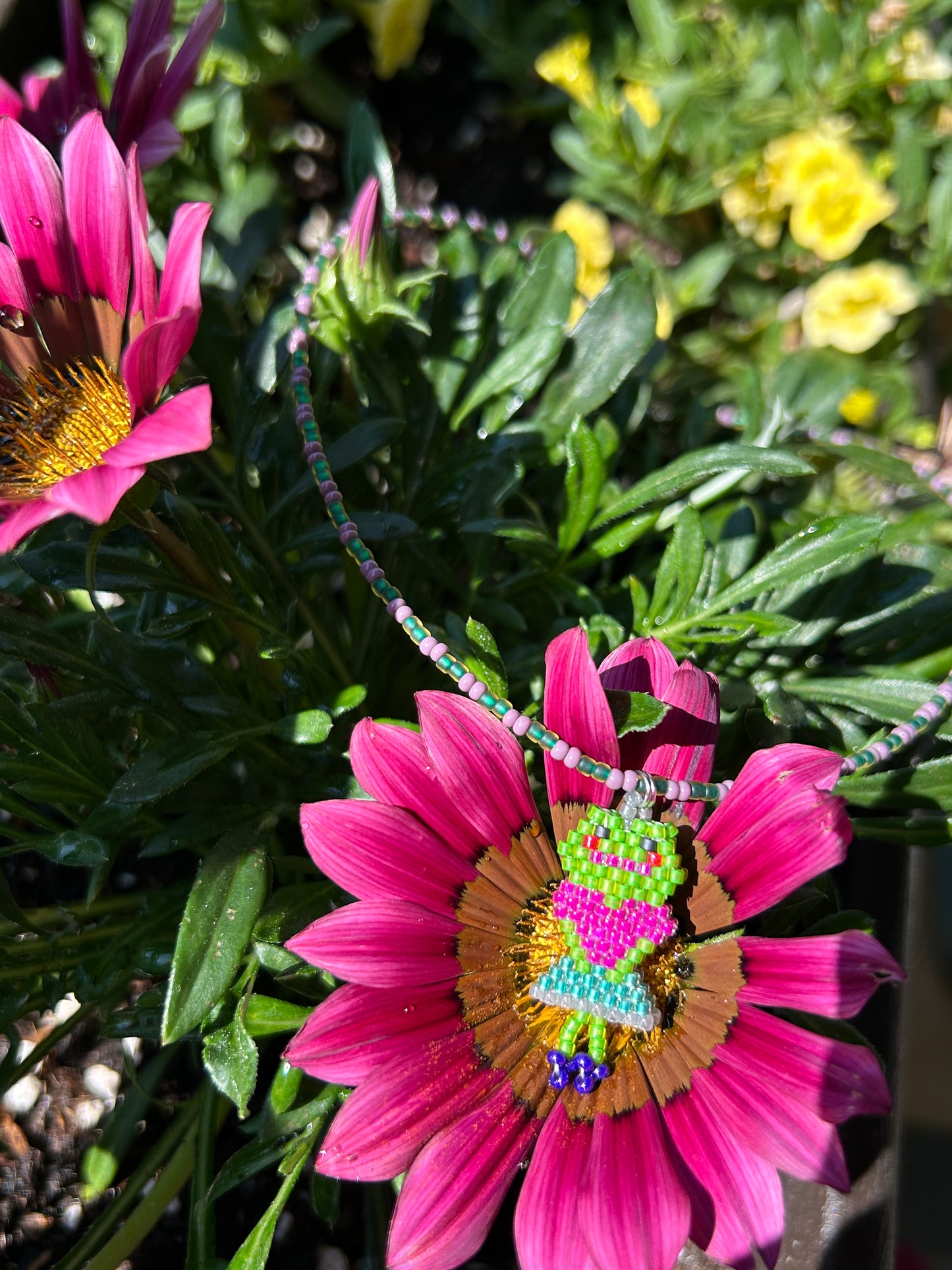 Beaded necklace with a frog