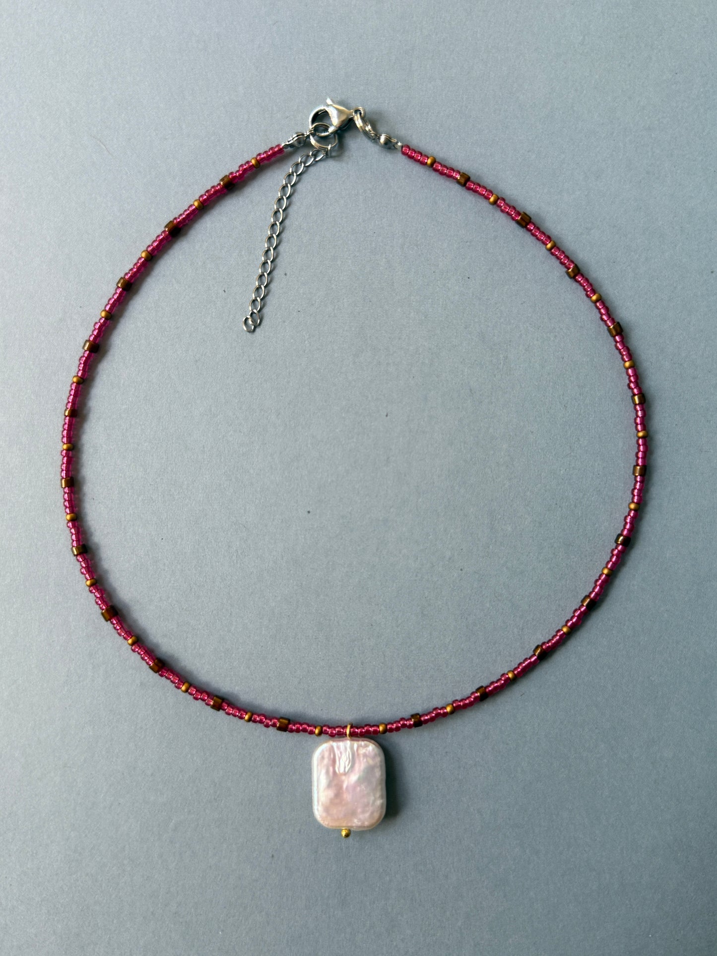 Beaded necklace with a pearl