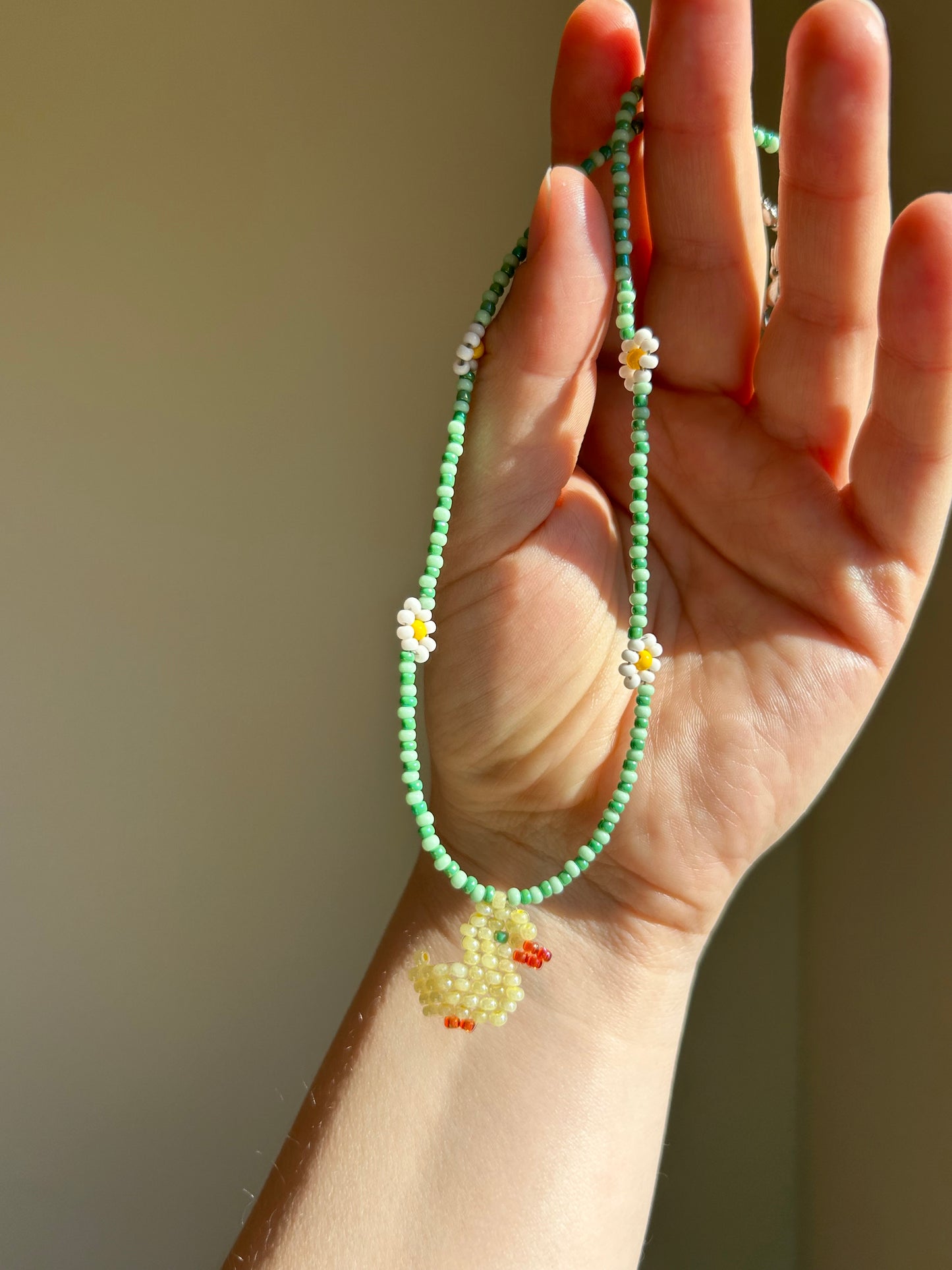 A little duck among the daisies