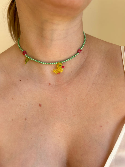 A like duck is looking for flower 🌺